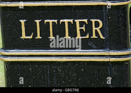 black  cast-iron litter bin with gold lettering Stock Photo