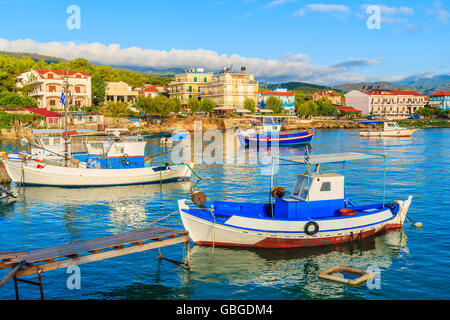 Greek fishing boats at sunrise in small port, Samos island, Greece Stock Photo