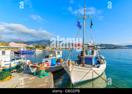 Greek fishing boats mooring in port in early morning, Samos island, Greece Stock Photo