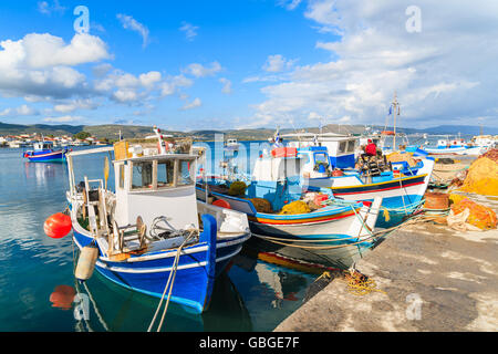 Colourful Greek fishing boats mooring in port on Samos island, Greece Stock Photo