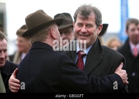 Horse Racing - Cheltenham Festival 2009 - Day One - Cheltenham Racecourse. Owner John P McManus (right) with trainer Jonjo O'Neill, after winning the William Hill Trophy Handicap Chase with Wichita Lineman. Stock Photo