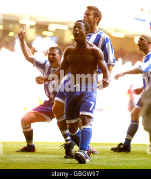 Soccer - Nationwide League Division Two - Play Off Final - Bristol City v Brighton & Hove Albion. Leon Knight celebrates in front of the jubilant Brighton & Hove Albion's fans after scoring the match winning penalty