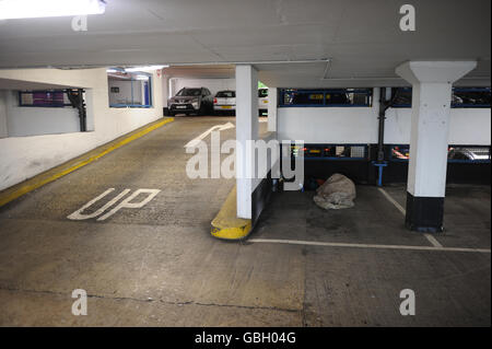 Homeless taking refuge in a car park in Southampton Stock Photo