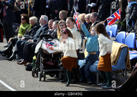 Visitors enjoy the celebrations during a St Patrick's Day parade held by the 1st Battalion Irish Guards at the Victoria Barracks in Windsor, Berkshire. Stock Photo