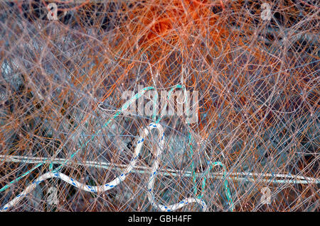 Fishing net arranged on a drying rack Stock Photo