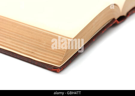 Close-up of blank pages in a bound, thick hardcover book on a white background Stock Photo