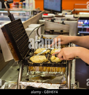 Preparing homemade Belgian waffles. Stock Photo