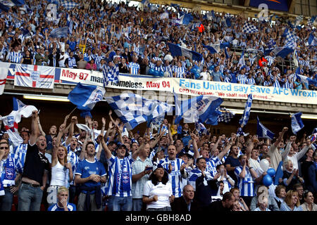 Soccer - Nationwide League Division Two - Play Off Final - Bristol City v Brighton & Hove Albion. Brighton & Hove Albion fans soak up the atmosphere as they cheer on their team Stock Photo