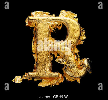 Alphabet and numbers in rough gold leaf isolated on black Stock Photo