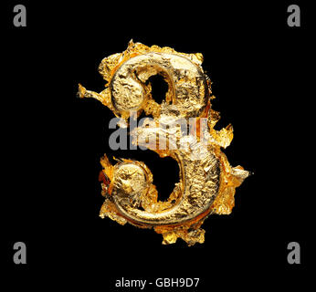 Alphabet and numbers in rough gold leaf isolated on black Stock Photo