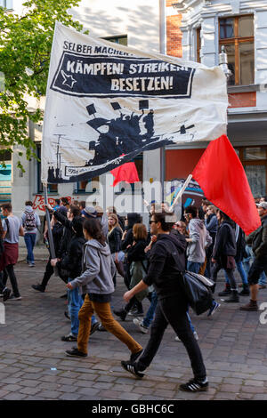 Young protesters in the streets in Berlin, Germany on May Day 2016. Stock Photo