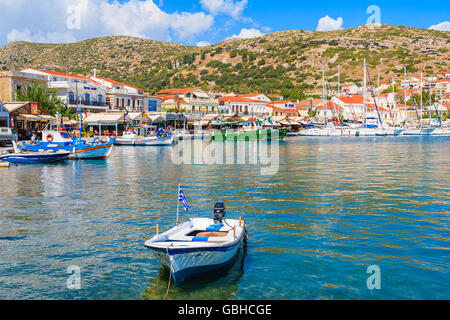 SAMOS ISLAND, GREECE - SEP 25, 2015: Greek fishing boat on sea water in Pythagorion port, Samos island, Greece. Stock Photo