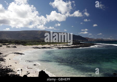 the Beach  Bajo de los Sables near the village of  Playa de la Canteria on the Island of Lanzarote on the Canary Islands of Spai Stock Photo