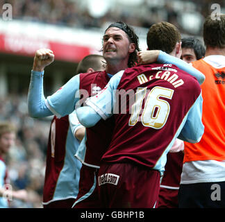 Soccer - Coca-Cola Championship - Derby County v Burnley - Pride Park. Burnley's Chris McCann celebrates his goal with Chris Eagles during the Coca-Cola Championship match at Pride Park, Derby. Stock Photo