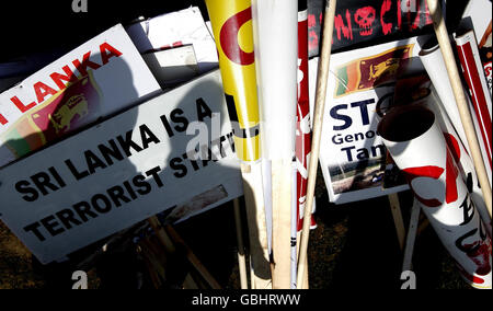 Placards belonging to demonstrators taking part in a protest to call for an immediate ceasefire in Sri Lanka, at Parliament Square, Westminster, London. Stock Photo