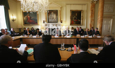 Prime Minister Gordon Brown (centre), Chancellor of the Exchequer Alistair Darling (right) and Secretary of State Peter Mandelson (left) meet with senior bank executives at 10 Downing Street, central London. Stock Photo