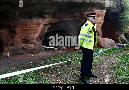 Police at the scene at the Hermitage Caves, near Bridgnorth, Shropshire, after a teenage boy was killed and another youngster was seriously injured when a cave roof collapsed during a camping trip. Stock Photo