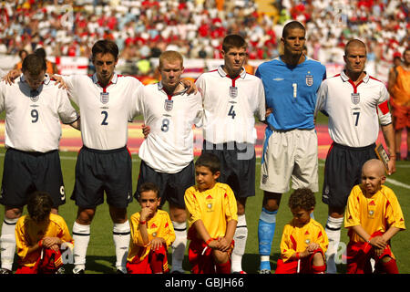 Soccer - UEFA European Championship 2004 - Group B - England v Switzerland. England players line up with mascots prior to kick off Stock Photo