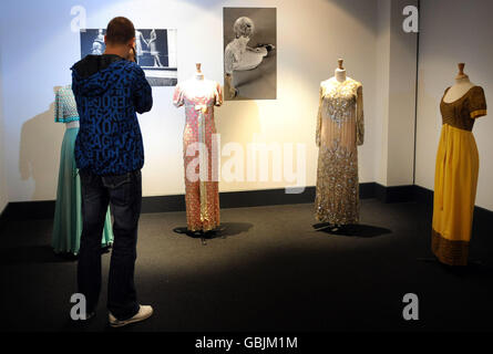 A fan takes photographs at a one day Dusty Springfield exhibition titled 'Dusty Day' at the British Music Experience in the O2 Arena in London, to coincide with the 10th anniversary of the singer's death. Stock Photo