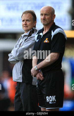 Doncaster Rovers manager Sean O'Driscoll (left) with assistant manager Richard O'Kelly, on the touchline during the match.. Stock Photo