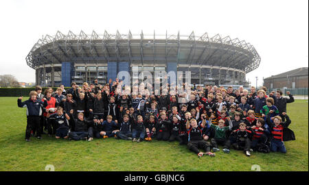 Ross High Rugby Team Edinburgh Rugby players pose with children from Ross High School during ...