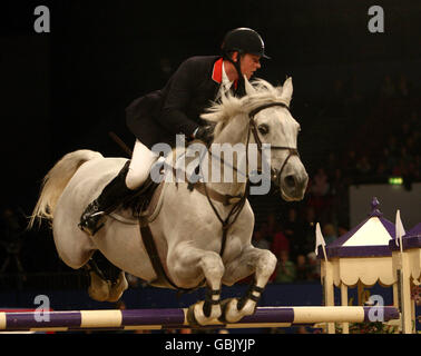 Equestrian - British Open Show Jumping Championships - LG Arena. Great Britain's Ryan Prater in action on 'Otage' during the British Open Show Jumping Championships at the LG Arena, Birmingham. Stock Photo