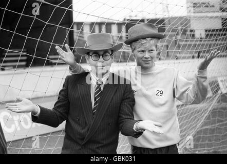 Elton John, left, Chairman of Watford FC at Vicarage Road ground with Maurice 'Mo' Johnston, promoting the FA Cup semi final between Watford and Third Division Plymouth. Stock Photo