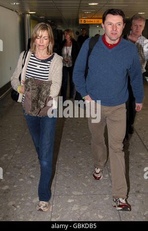 Kate and Gerry McCann prepare to fly out of Heathrow Airport, Middlesex, to the United States to film an interview for the Oprah Winfrey Show to mark two years since their daughter Madeleine's disappearance. Stock Photo