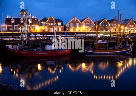 Illuminated harbour area, North Sea resort of Neuharlingersiel, North Sea, East Frisia, Lower Saxony Stock Photo