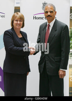 Home Secretary Jacqui Smith meets the new US Attorney General Eric Holder inside the Home Office in central London. Stock Photo