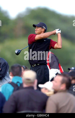 Tiger Woods tees off on the first hole during the third round of the ...