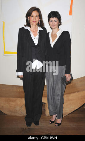 Audrey Tautou and director Anne Fontaine arrive at the Coco avant Chanel film screening at the Soho Hotel in London. Stock Photo