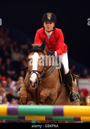 Great Britain's Ellen Whitaker in action during the British Open Show Jumping Championships at the LG Arena, Birmingham. Stock Photo