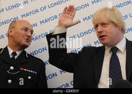 London Mayor Boris Johnson and Metropolitan Police Commissioner Sir Paul Stephenson announce a strategy to end violence against women in London. Stock Photo