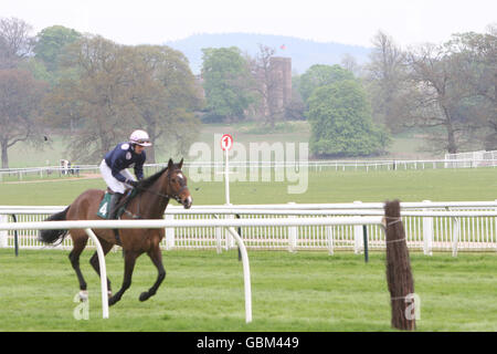 Horse Racing - Stan James Perth Festival - Day Three - Perth Racecourse. First Boy ridden by Tjade Collier prior to the stanjames.com Novices' Handicap Chase with Scone Castle visible in the background Stock Photo