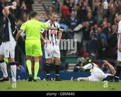 Referee Dougie McDonald awards a penalty to Falkirk for a foul on Neil McCann (grounded) during the Homecoming Scottish Cup Semi Final match at Hampden Park, Glasgow. Stock Photo