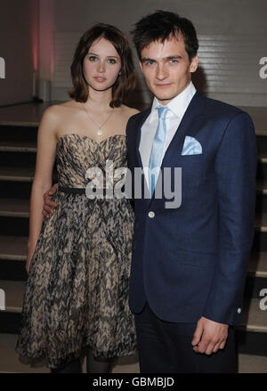 UK film premiere of Cheri - London. Felicity Jones and Rupert Friend arrive for the UK premiere of Cheri, at the Cine Lumiere, London. Stock Photo