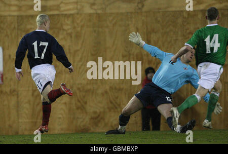 Scotland's Leigh Griffiths scores the third goal during the Tennents B International Challenge match at Broadwood Stadium, Cumbernauld. Stock Photo