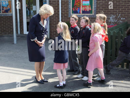 Camilla, Duchess of Cornwall talks to pupils as she visits the new Bellefield Church of England Primary and Nursery School in Trowbridge, Wiltshire. Stock Photo