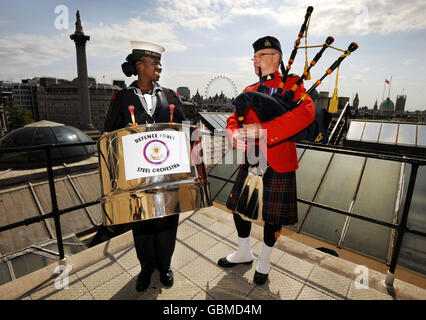 Dianna Pierre of the Trinidad and Tobago Defence Force of the world's only military steel orchestra and Pipe Sergeant Gilbert Young of the Royal Canadian Mounted Police Band on the roof of Canada House, London ahead of their performance at the Windsor Castle Royal Tattoo between May 13th to 17th. Stock Photo