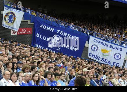 General view of Chelsea fans in front of a 'Cyprus Blues' banner