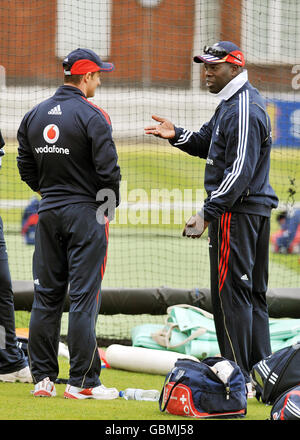 Cricket - England Practice Session - Lord's. England captain Andrew Strauss speaks with bowling coach Otis Gibson during the practice session at Lord's, London. Stock Photo