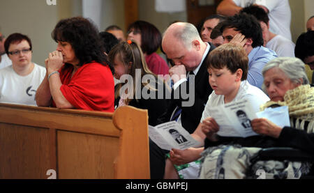 Family and friends of murdered schoolboy Jimmy Mizen, during a memorial service to mark the first anniversary of Jimmy's death, held at the Our Lady of Lourdes Church in London. Stock Photo