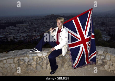 Athens Olympic Games 2004 - British Olympic Association Press Conference. Great Britain's Judo competitor, Kate Howey, holds the Union Jack flag aloft Stock Photo