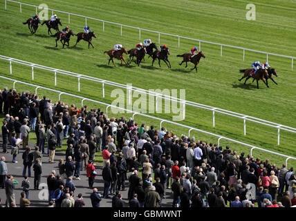 Runners and Riders in the Aon London Gold Cup Heritage Handicap at Newbury Racecourse, Berkshire. Stock Photo