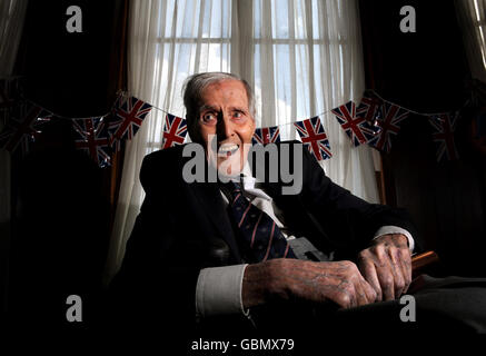 Olympics - Britain's Oldest Olympian Godfrey Rampling celebrates his 100th Birthday - Bushey House. Britain's oldest Olympian Godfrey Rampling celebrates his 100th Birthday during a party at Bushey House, Bushey. Stock Photo