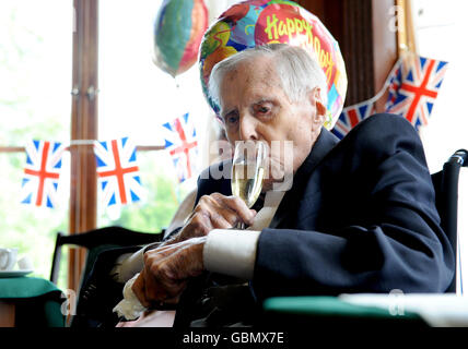 Olympics - Britain's Oldest Olympian Godfrey Rampling celebrates his 100th Birthday - Bushey House Stock Photo