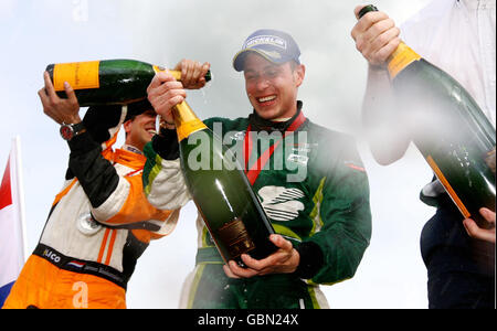 Auto - British A1 Grand Prix - Race - Brands Hatch. Ireland's Adam Carroll celebrates victory in the feature race and winning the championship after the British A1GP at Brands Hatch, Kent. Stock Photo