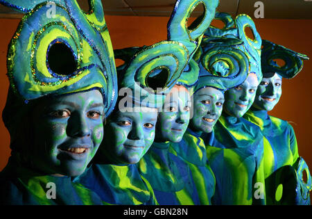 Sea themed Carnival Dancers pose for pictures during the launch celebrations of the UK Centre for Carnival Arts in Luton. Stock Photo