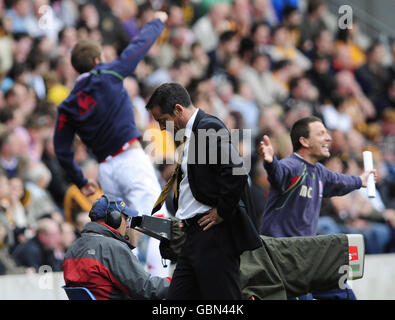 Hull City Manager Phil Brown reacts as his side go two goals down to Stoke City during the Barclays Premier League match at the KC Stadium, Hull. Stock Photo